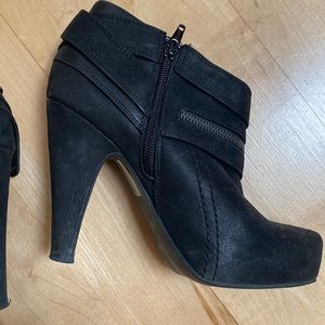 Aldo black suede like black ankle high heeled ankle booties.